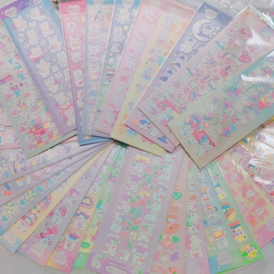 Detailed fan layout of cute cartoon animal stickers in pastel macaron colors