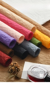 Macro detail of multicolored textured crinkle paper for elegant floral bouquet wrapping