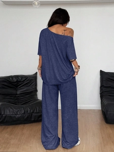 Back view of a blue-gray casual two-piece set with off-shoulder top and wide-leg trousers