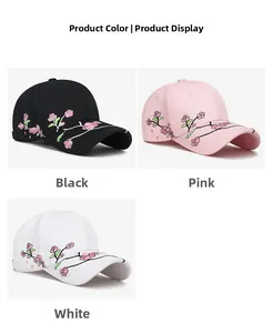 Close-up of plum blossom embroidery on cotton baseball cap in black, pink and white