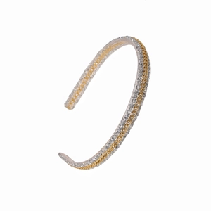 Fashionable open C-shape resin bangle with embedded gold chain and white crystals