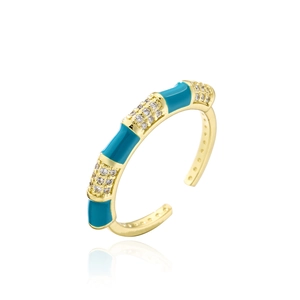 Detail of 18K gold plated ring with blue enamel sections and micro-set cubic zirconia
