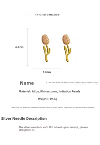 Detail view of tulip earrings with pearls and crystals measuring 6.4cm by 1.6cm