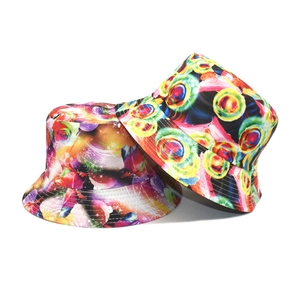 Outdoor summer bucket hats with vibrant digital floral and geometric print patterns