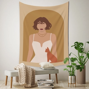 Detail of bohemian tapestry featuring a woman and cat illustration in warm earth tones