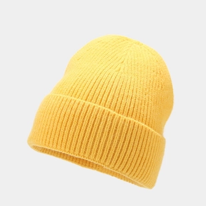 Close-up of lemon yellow rib-knit beanie showing the soft texture and thick folded cuff
