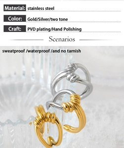 Detail view of gold and silver stainless steel knotted rings with PVD plating finish