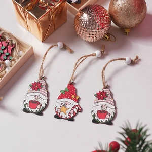 Detailed view of hand-painted wooden Christmas gnome ornaments with jute hanging ropes