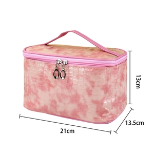 Pink stone pattern travel makeup bag with handle and clear size dimensions 21x13.5x13cm