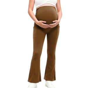 Brown high-waisted maternity yoga flare pants with side pockets and belly support