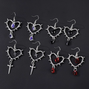 Gothic thorn heart earrings set with colorful teardrops and silver crosses on black leather