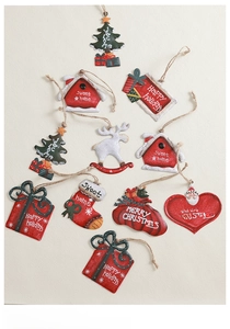 Detail of Nordic tin Christmas ornaments featuring hand-painted retro reindeer and snow houses