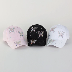 Stylish baseball caps for women with colorful rhinestone butterfly patterns in pink black white