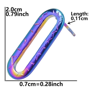 Macro detail of oval rainbow titanium earrings showing iridescent colorful plating