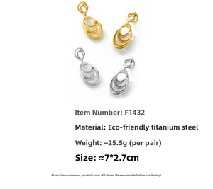 Detailed view of triple-layered oval hoop earrings in gold titanium steel with dimensions