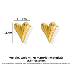 Detailed view of gold heart earrings with 1.1cm by 1.4cm dimensions in stainless steel