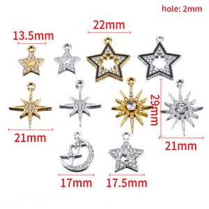 Golden and silver alloy star and moon pendants with rhinestones in various sizes