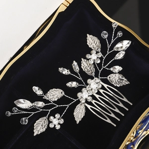 Exquisite bridal hair comb with silver leaves, rhinestones and pearls in a velvet box