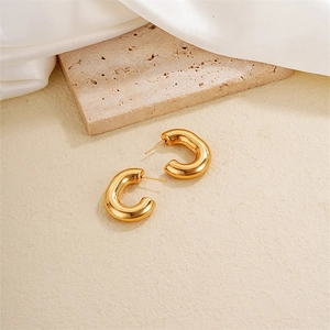 French style gold-finished thick C-shaped hoop earrings on elegant textured base