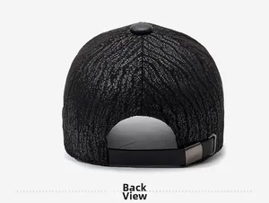 Detail view of the black PU leather baseball cap featuring bark texture and metal buckle