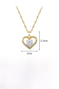 Detailed view of gold heart necklace pendant with dimensions 2cm by 2.3cm and chain length