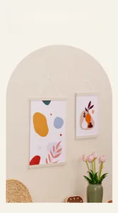 Detail of wooden magnetic poster hanger showing natural wood texture and hanging string