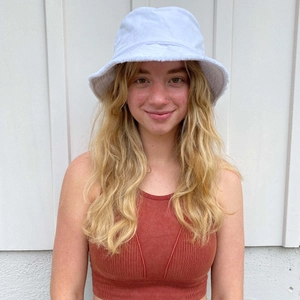 Vintage frayed edge white canvas bucket hat for women in washed cotton with foldable design