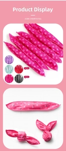 Close-up of soft polka dot sponge hair rollers showing flexibility and various colors