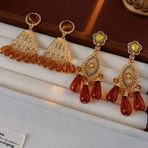 Vintage gold-plated earrings with tiger eye stones and amber resin fringe tassels