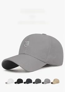 Detail of lightweight breathable mesh fabric and embroidered shield logo on summer caps