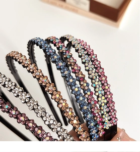 Close-up of sparkling rhinestone headbands in multiple colors for hair styling