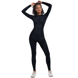 Detail of black seamless compression yoga set showing breathable textures and high-stretch fabric
