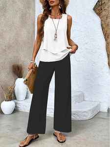 Women's summer two-piece set featuring white sleeveless top and black wide-leg trousers