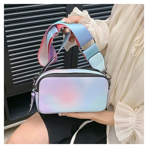 Detail of colorful gradient camera bag for women with wide shoulder strap and dual zippers