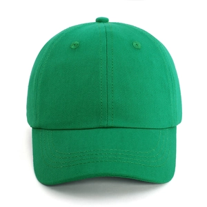 Detailed view of green cotton twill kids baseball cap with reinforced stitching