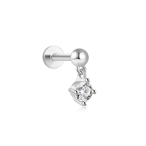 Close-up of S925 silver labret stud with a sparkling cz stone dangle on white background