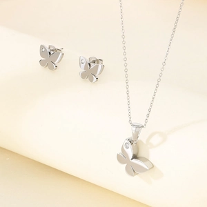 Minimalist silver butterfly necklace and earring set with sparkling zircon stones
