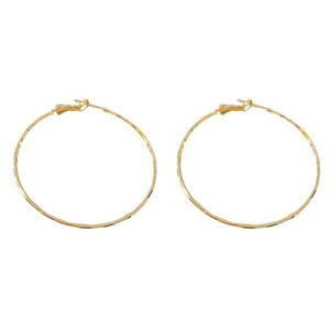 Paire de grandes boucles d'oreilles créoles rondes dorées au fini poli brillant