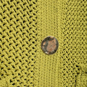 Retro grass green knitted sweater vest with textured chunky knit and vintage metal button