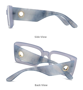 Detail view showing marble texture temples and golden circular logo on purple sunglasses