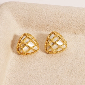 Close-up of gold triangular stud earrings with woven mesh design and white enamel inlay