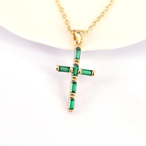 Elegant gold cross necklace featuring six rectangular emerald green zircon stones