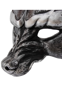 Close-up of wolf party mask showing silver and black fur texture with metallic finish