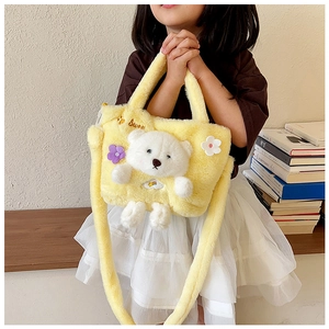 Detail of yellow plush handbag with 3D white bear and floral embroidery for girls