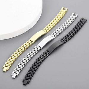 Macro shot of stainless steel watchband bracelets in gold, silver, and black colors