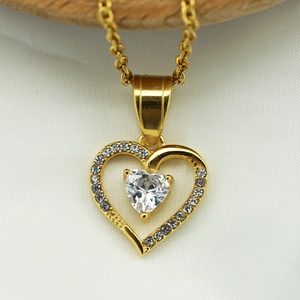 Detailed shot of 316L stainless steel heart pendant with sparkling cubic zirconia stones
