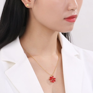Gold titanium steel jewelry set featuring red flower petal pendant necklace and studs