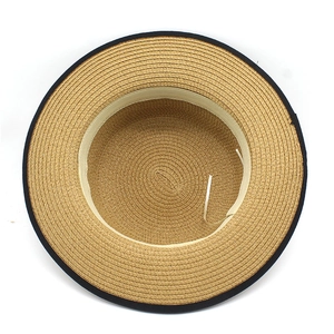 Detail view of straw sun hat interior with sweatband and adjustable drawstring