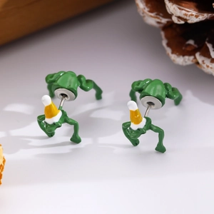 Detailed close-up of a 3D frog earring with a Christmas hat and split-body design