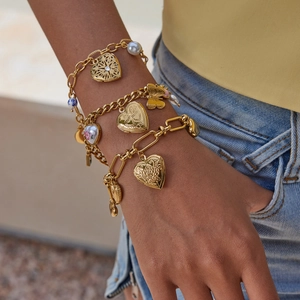 Multilayer gold stainless steel bracelet set with heart locket and butterfly charms